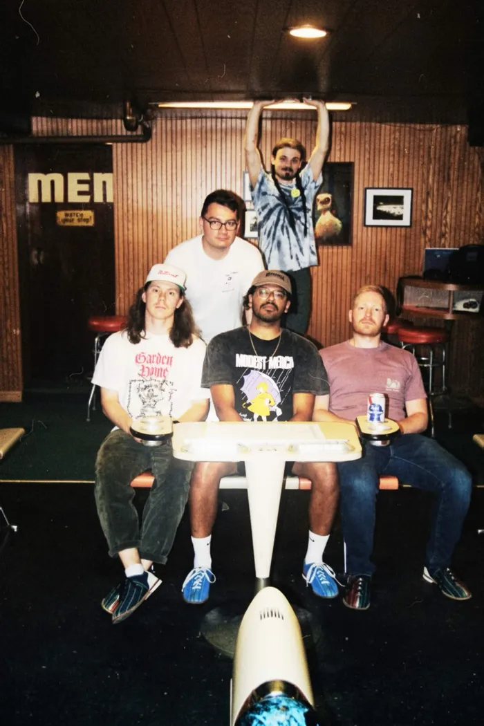tenmonthsummer, the full band hanging out at a bowling alley